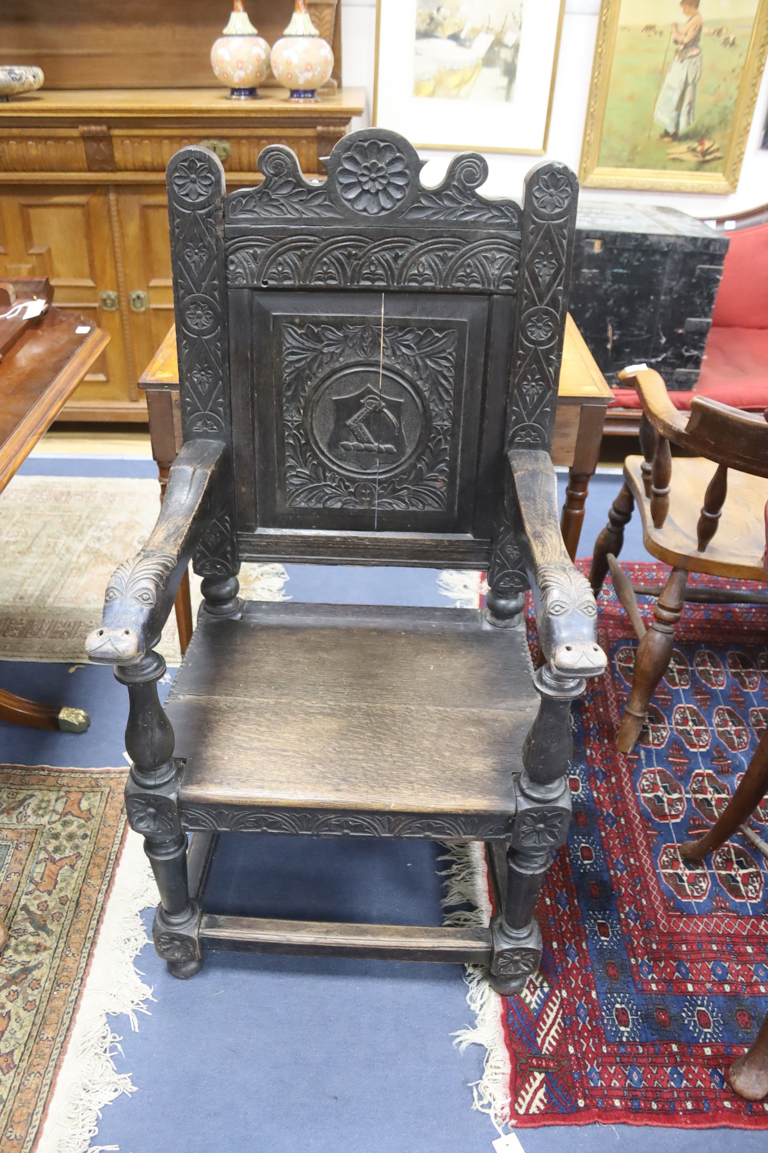 An oak wainscot chair in 17th century style